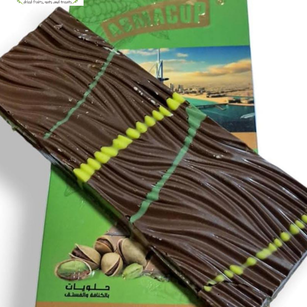 Chocolate bar with green string on a green and brown packaging background