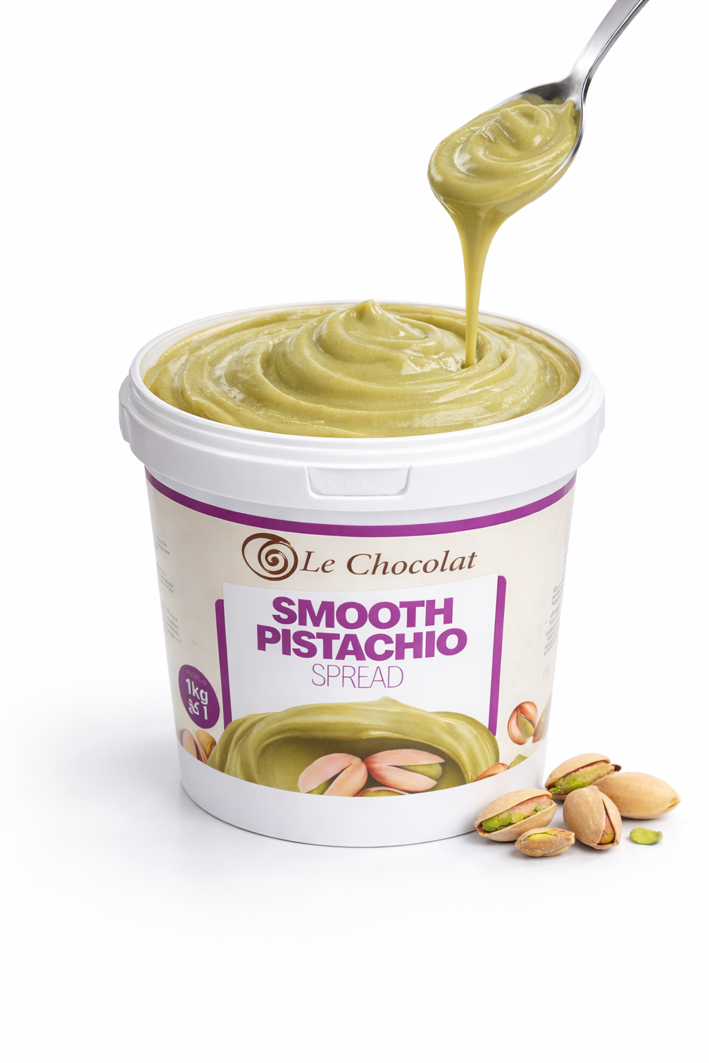 Container of Le Chocolat Smooth Pistachio Spread with a spoonful being lifted out.